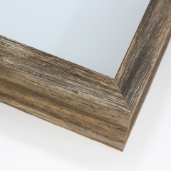 This grey and brown shadow box features a 7/8 " face width with a 2-7/16 " depth. This natural wood frame gives off a rustic appearance.
