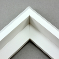 This unique floater frame for stretched canvas features a narrow, 0.5 " face that falls into a steep reverse slant toward the outer edge of the frame.  The modern style is finished in matte white.

Ideal for mounting medium to extra large, thick (1.5 " deep) gallery wrapped canvas portraits, paintings or Giclée prints. The canvas will extend slightly farther than the face of the frame. 

*Note: These solid wood, custom canvas floaters are for stretched canvas prints and paintings, and raised wood panels.