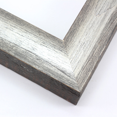 This simple but expressive frame features a smooth, natural wood face with a rougher, organic drop edge. The matte grey finish is overlaid with silver for an antiqued richness.

1.75" width: ideal for medium size artworks. The natural simplicity of this countryside frame is the perfect match for nature or farmland photographs or oil paintings.