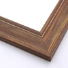 This natural-wash wood frame features a soft brown varnish that highlights the rich wood grain.  Antiquing is created by nicks that add character and depth to the subtlety bevelled face.

2 " width: ideal for medium size images.  Border a rustic nature photograph, or autumnal painting or print with this simple, bucolic frame.