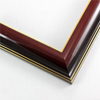 An elegant molding with bright gold detailing on the inner and outer edges. The face fades from scarlet red on the interior to medium chocolate brown. Brown grain can be seen through the scarlet stain. This frame has an ultra high gloss finish.