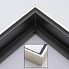 This solid wood canvas floater picture frame features a shiny brushed silver on the outside edge and narrow face. The long inside step and base are a matte black.
Display your favourite gallery wrapped canvas Giclée print or oil painting with authentic, fine art style. This canvas floating frame is ideal for large, thich (1.5 " deep) canvas images.
*Note: These canvas floaters are for stretched canvas prints and paintings, and raised wood panels.
