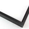 Tall, yet slim 7/16 " metal frame with a hooked profile. This moulding is frosted mars black with a slight brushed texture. It reflects diluted light.

Nielsen n117-21 Profile
