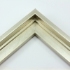 This stair step wood floater frame with a high shine lets your canvas hover neatly within the simple, modern border. The frame features a brushed silver finish with a steep upper and small lower step. The iridescent color varies slightly in different light, running from warm, muted gold to cool, opaque silver.
Give an authentic, fine art display to your favourite Giclée print or oil painting. This size is ideal for thin (3/4 " deep) gallery wrap canvases. The canvas may protrude slightly above the frame face.
*Note: These solid wood, custom canvas floaters are for stretched canvas prints and paintings, and raised wood panels.