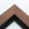 This simple but expressive floater frame features an organic wood grain face, complete with whorls and shallow ridges. The rich, matte walnut finish highlights the natural texture.
1.75" width: ideal for medium size artworks. The natural simplicity of this countryside frame is the perfect match for nature or farmland photographs or oil paintings.