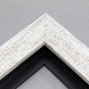 This simple but expressive floater frame features an organic wood grain face, complete with whorls and shallow ridges. The matte white finish is roughly applied for an antiqued look.
Ideal for medium and large size artworks. The natural simplicity of this countryside frame is the perfect match for nature or farmland photographs or oil paintings.