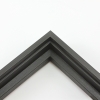 This stair step floating canvas frame in matte black with a natural wood grain texture features a shallow recessed stair below the outer face. The canvas will hover neatly, resting on the lowest, flat edge.
Give an authentic, fine art display to your favourite canvas Giclée print or acrylic painting. This canvas floating frame is ideal for medium and large images stretched on thin (3/4 " deep) stretcher bars.
*Note: These solid wood, custom canvas floaters are for stretched canvas prints and paintings, and raised wood panels.