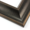This bold frame features a steep reverse scoop profile with a broken line detail on matte black.  The inner lip drops sharply in toward the image; both edges are brushed with a subtle bronze leaf.

3 " width: ideal for large or oversize artwork. Select a strong image for this frame, to ensure the heavy border doesn