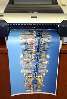 A Giclée Ink Jet printer, and the newly printed canvas