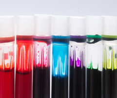 Vials of multi-colored ink